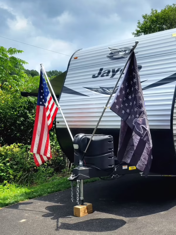 Are sectional or telescoping flag poles stronger?