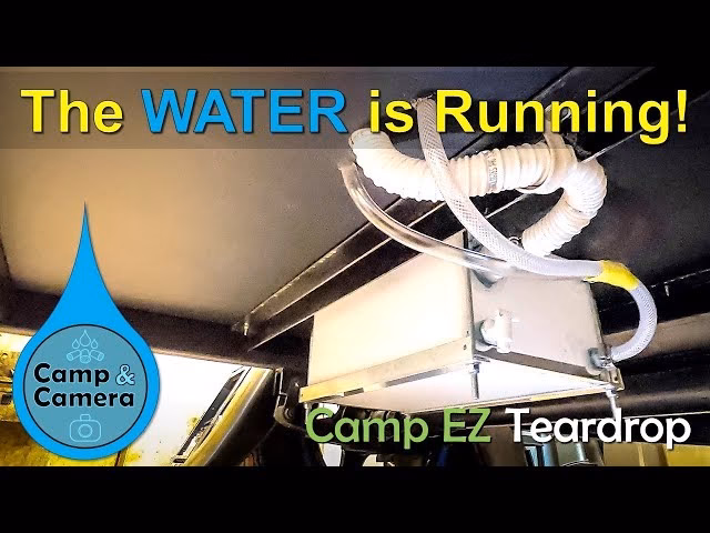 How do campers get water for showers?