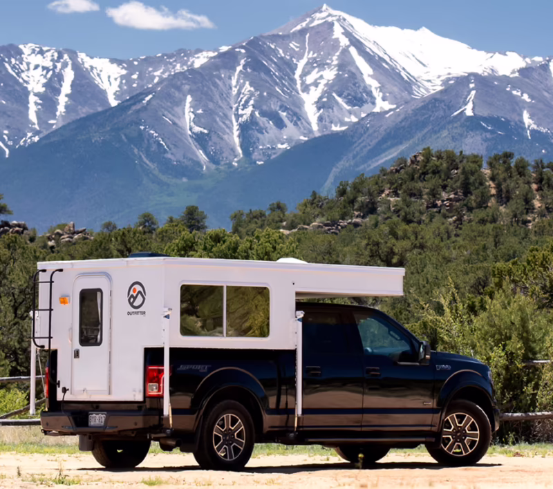 What is a truck bed camper called?