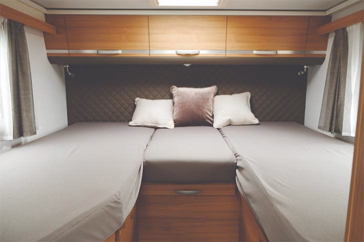Which motorhomes have fixed single beds?